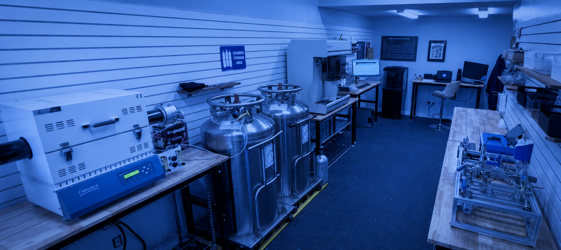 Goodwin Technologies laboratory with carbon testing equipment, workbenches, instrumentation, and engineering tools.